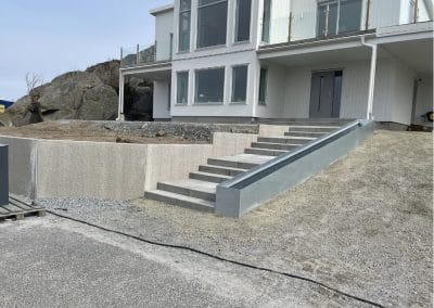 Stenläggning i Rönnäng på Törn (L-stödsmur och trappor)